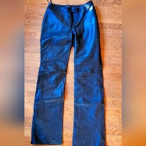 Bebe 100% leather pants. Size 2. Color black.